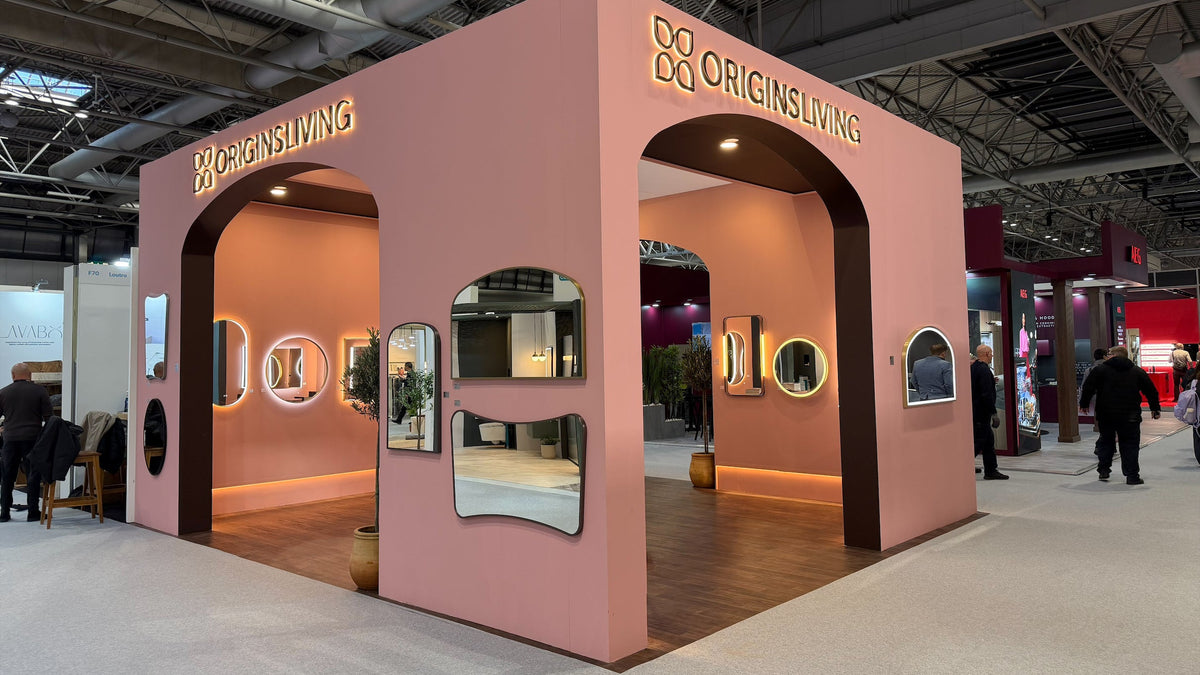 lluminated Origin Living logo signs created for an exhibition stand